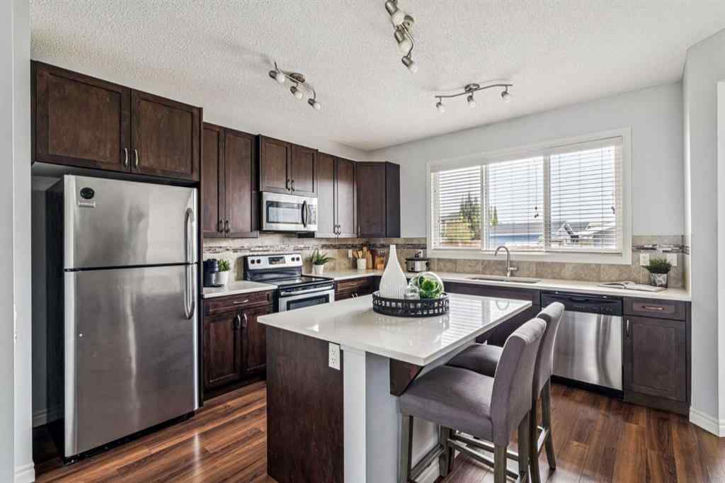 MLS® A2255031 - 91 River Heights Green  in River Heights Cochrane, Residential