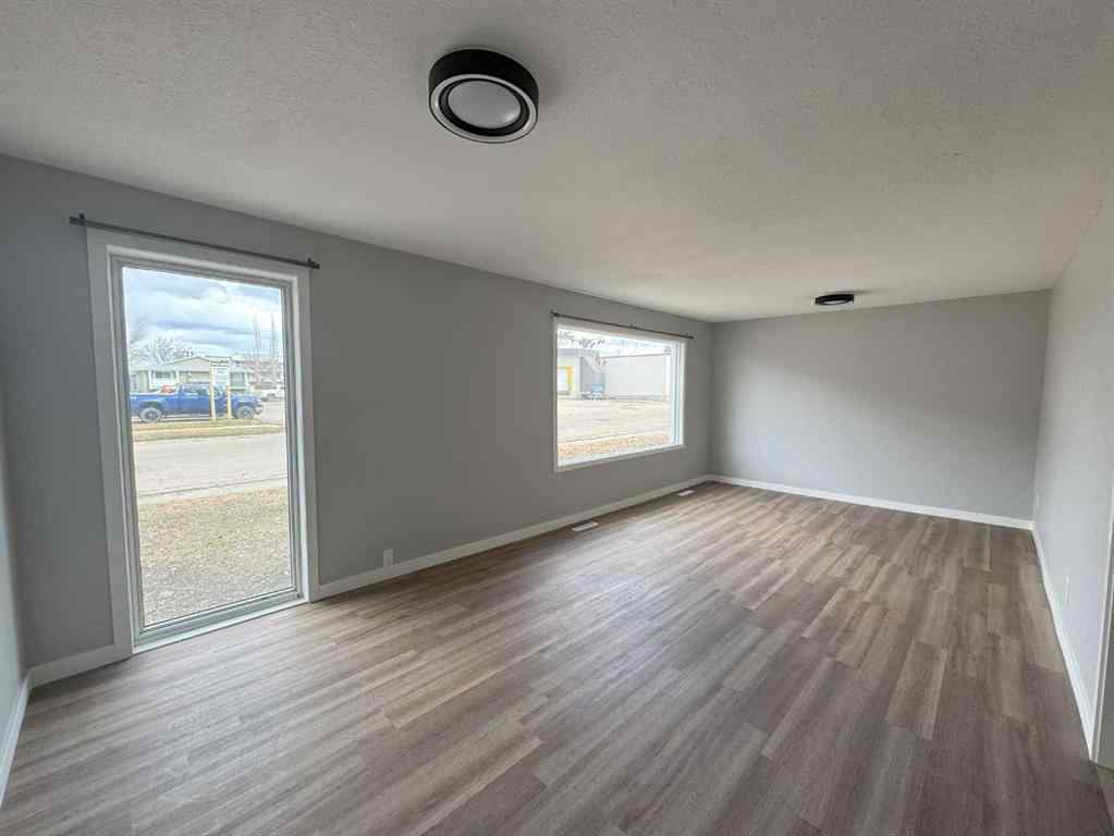 MLS® A2255032 - 10021 106 Avenue  in Avondale Grande Prairie, Residential