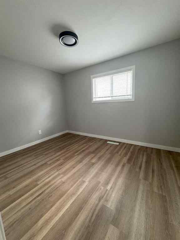 MLS® A2255032 - 10021 106 Avenue  in Avondale Grande Prairie, Residential