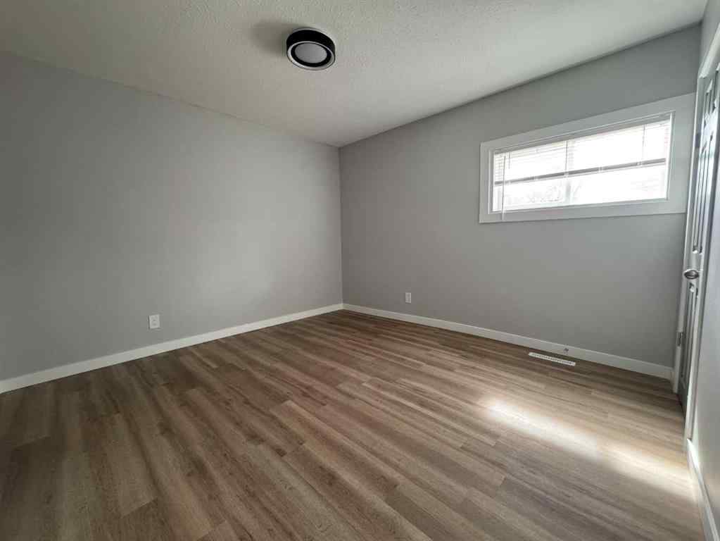 MLS® A2255032 - 10021 106 Avenue  in Avondale Grande Prairie, Residential