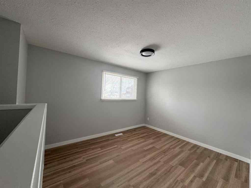 MLS® A2255032 - 10021 106 Avenue  in Avondale Grande Prairie, Residential