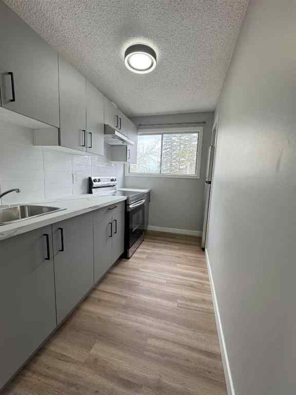 MLS® A2255032 - 10021 106 Avenue  in Avondale Grande Prairie, Residential