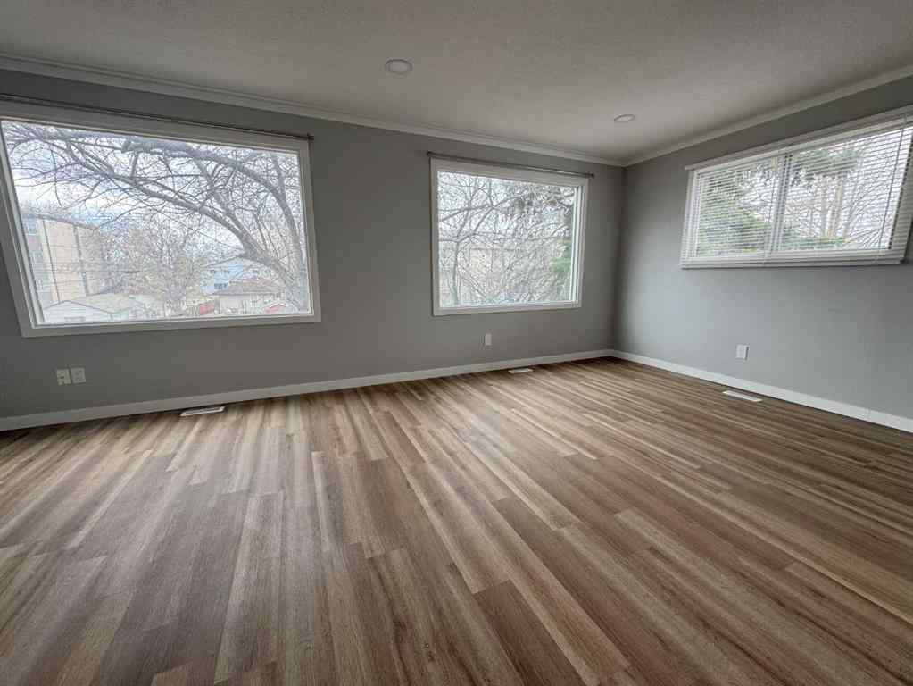 MLS® A2255032 - 10021 106 Avenue  in Avondale Grande Prairie, Residential