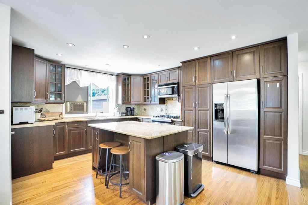 MLS® A2255033 - 1447 Northmount Drive NW in Brentwood Calgary, Residential