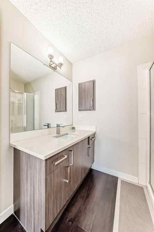 MLS® A2255046 - Unit #214 10 Westpark Link SW in West Springs Calgary, Residential