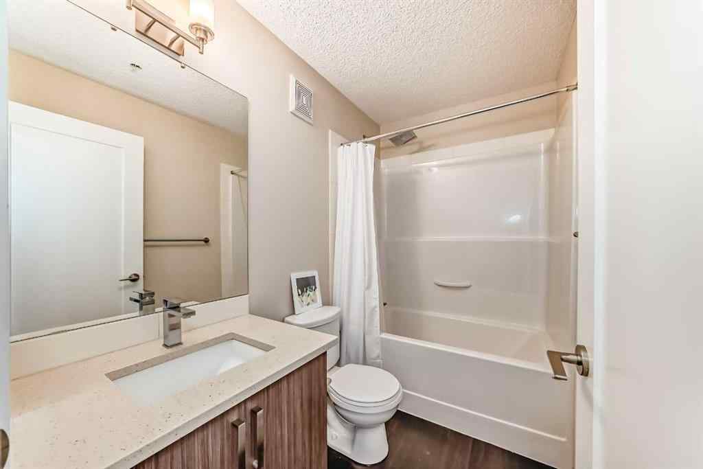 MLS® A2255046 - Unit #214 10 Westpark Link SW in West Springs Calgary, Residential