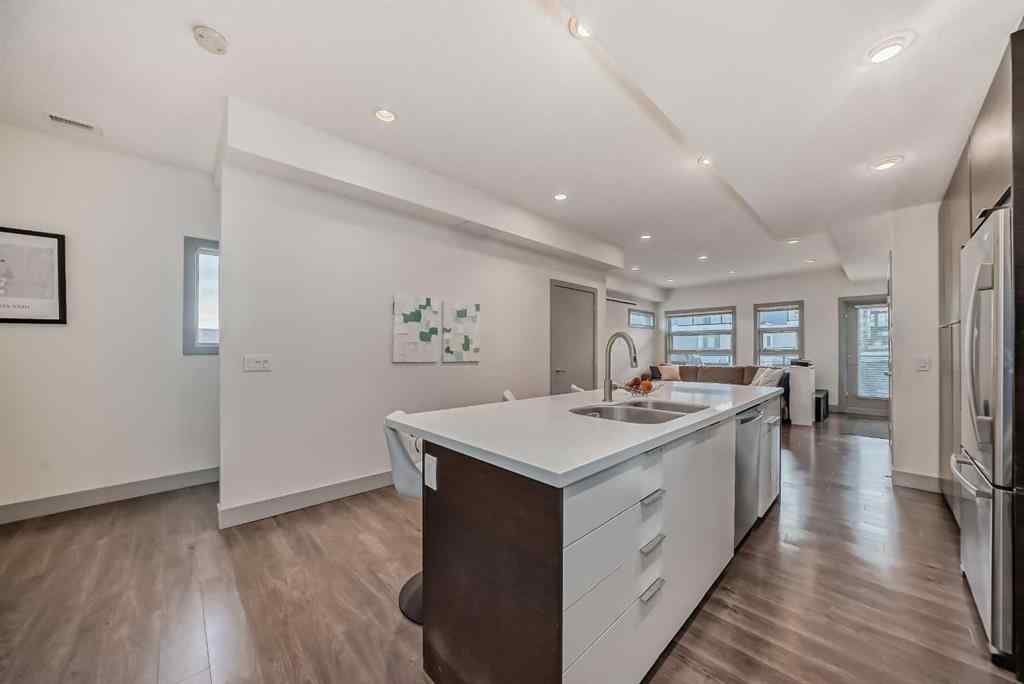 MLS® A2255056 - Unit #204 1707 27 Avenue SW in South Calgary Calgary, Residential