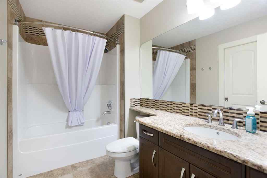 MLS® A2255078 - 102 Cooperstown Lane SW in Coopers Crossing Airdrie, Residential