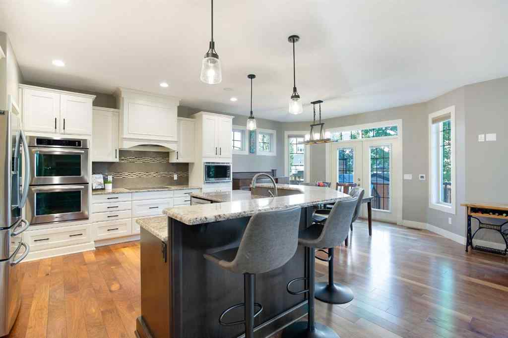 MLS® A2255078 - 102 Cooperstown Lane SW in Coopers Crossing Airdrie, Residential