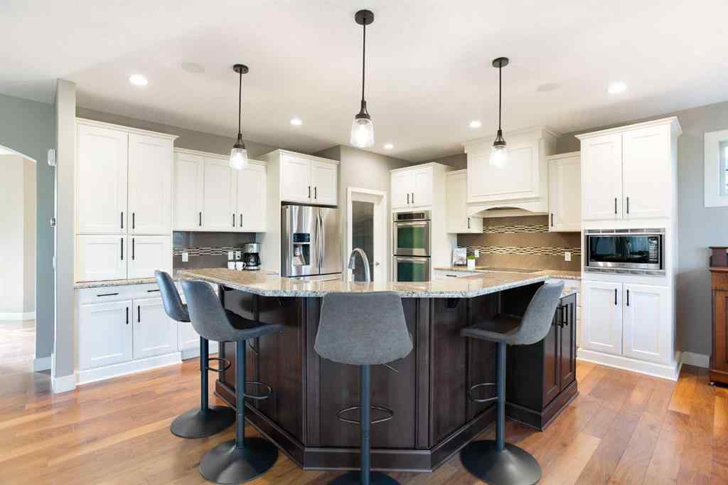 MLS® A2255078 - 102 Cooperstown Lane SW in Coopers Crossing Airdrie, Residential