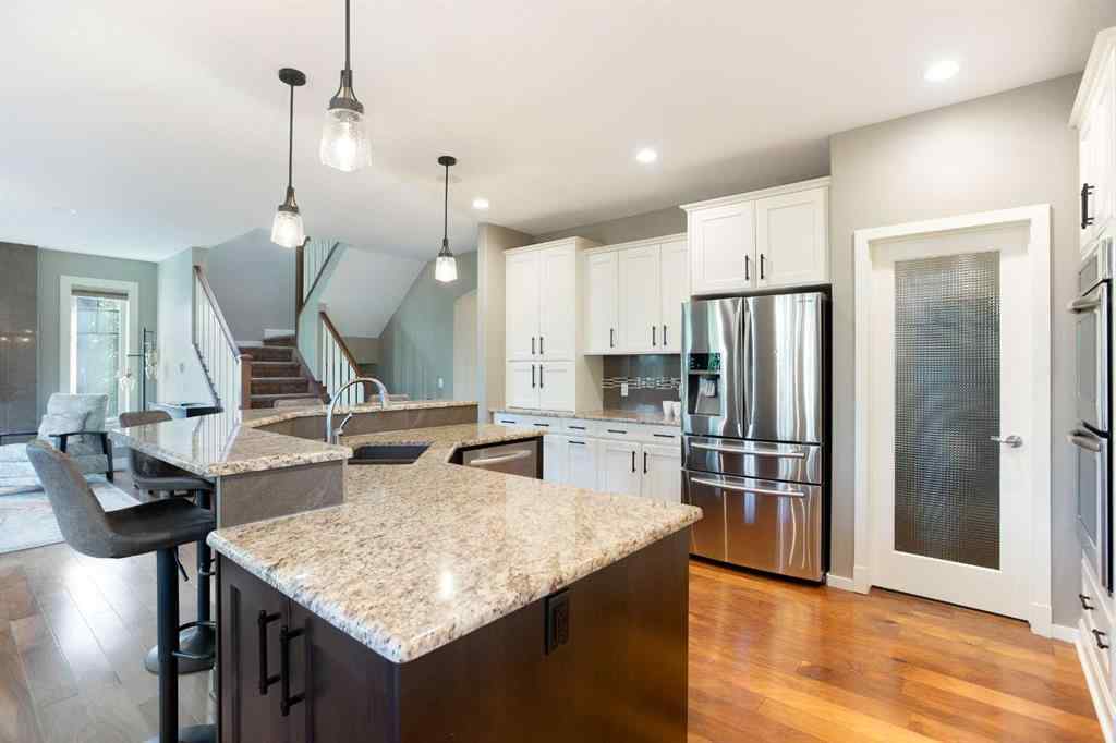 MLS® A2255078 - 102 Cooperstown Lane SW in Coopers Crossing Airdrie, Residential