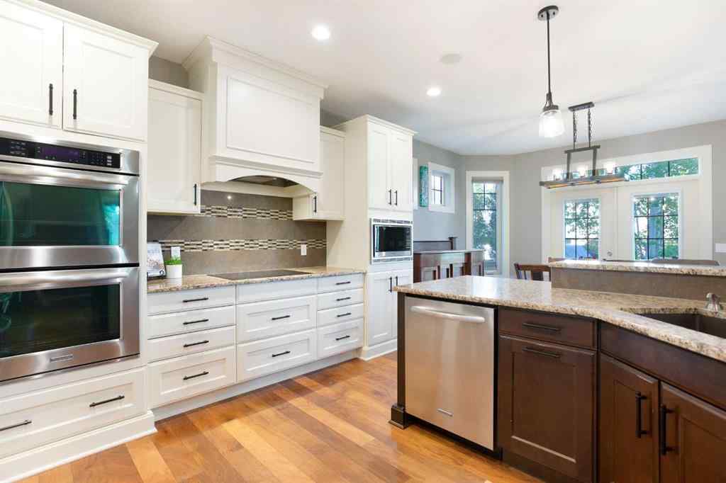 MLS® A2255078 - 102 Cooperstown Lane SW in Coopers Crossing Airdrie, Residential