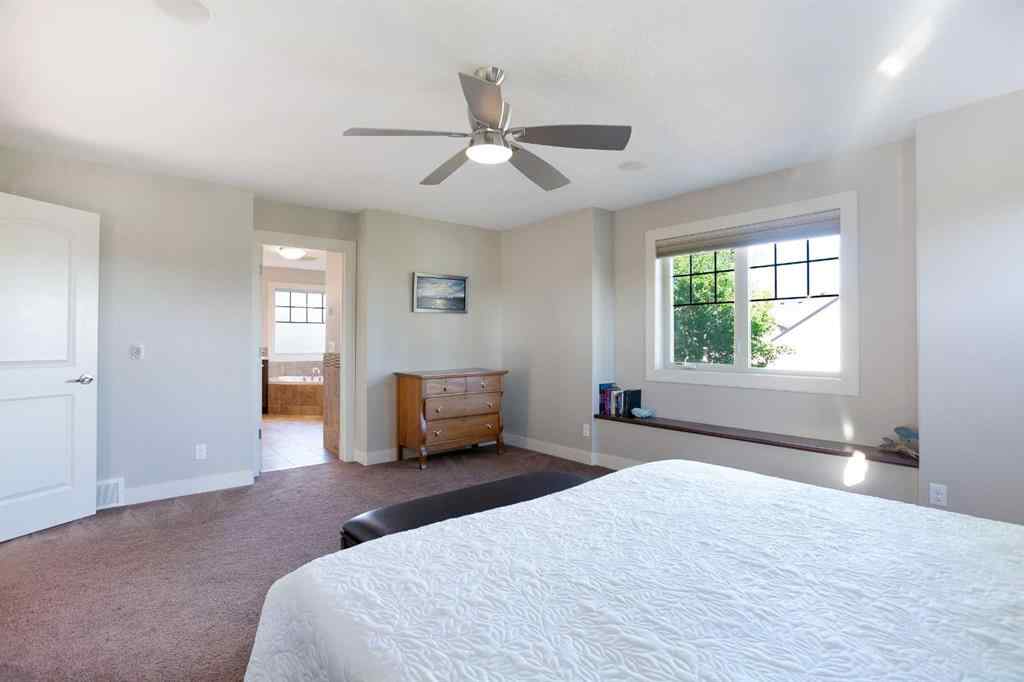 MLS® A2255078 - 102 Cooperstown Lane SW in Coopers Crossing Airdrie, Residential