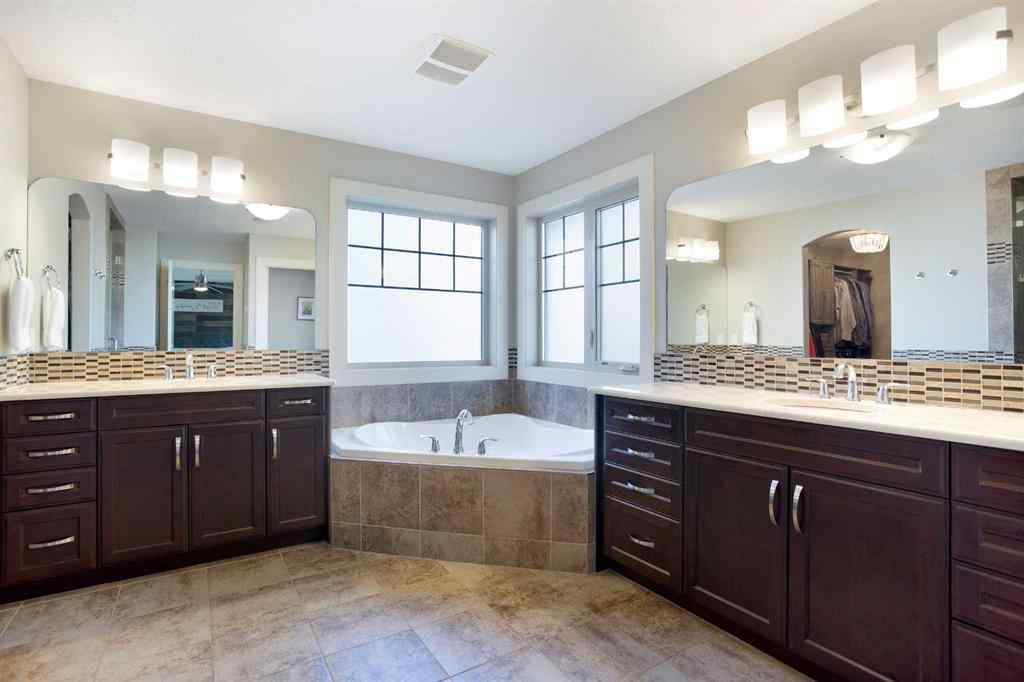 MLS® A2255078 - 102 Cooperstown Lane SW in Coopers Crossing Airdrie, Residential