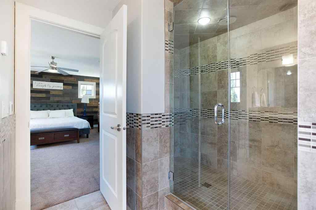 MLS® A2255078 - 102 Cooperstown Lane SW in Coopers Crossing Airdrie, Residential