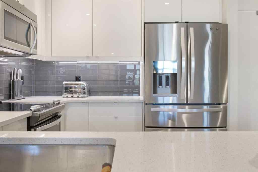 MLS® A2255088 - Unit #227 15 Aspenmont Heights SW in Aspen Woods Calgary, Residential