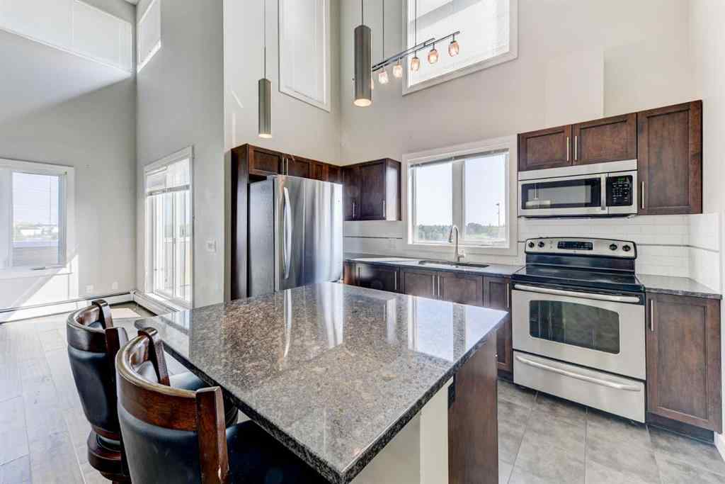 MLS® A2255091 - Unit #2432 604 East Lake Boulevard NE in East Lake Industrial Airdrie, Residential