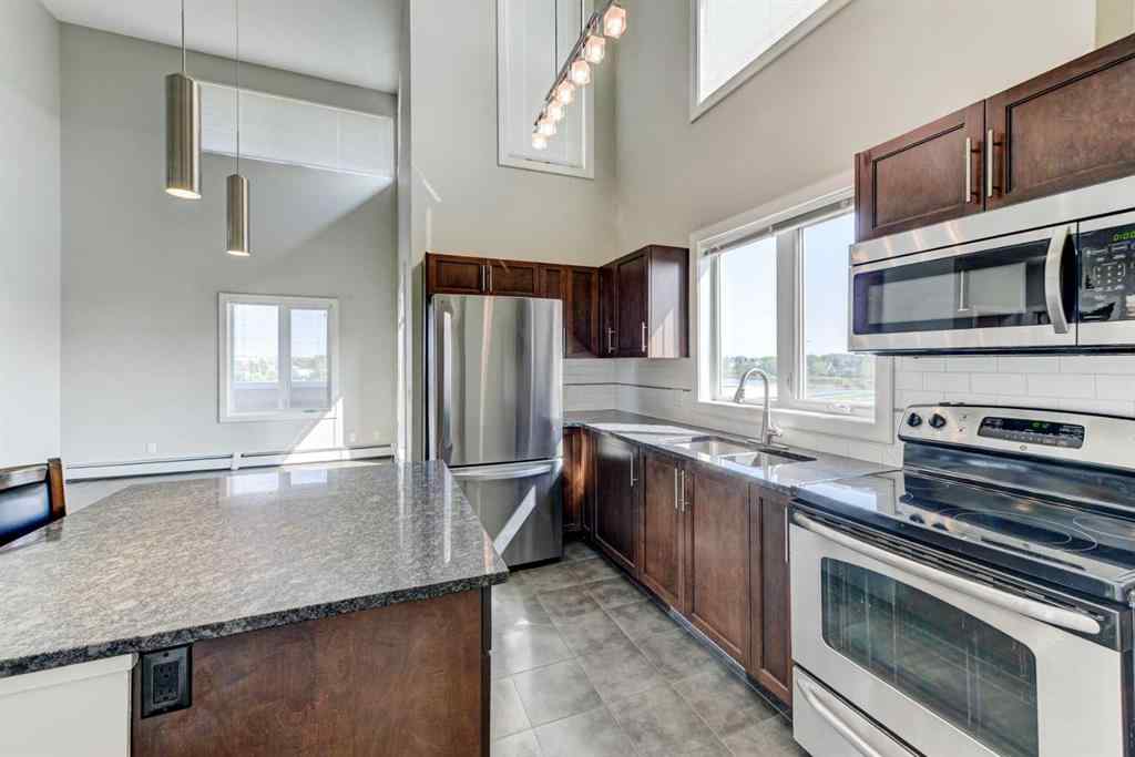 MLS® A2255091 - Unit #2432 604 East Lake Boulevard NE in East Lake Industrial Airdrie, Residential