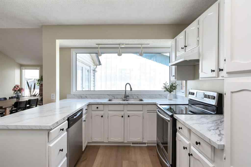 MLS® A2255105 - 124 Midpark Drive SE in Midnapore Calgary, Residential