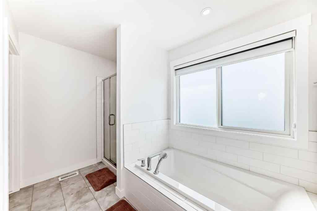 MLS® A2255106 - 103 Creekstone Park SW in Pine Creek Calgary, Residential