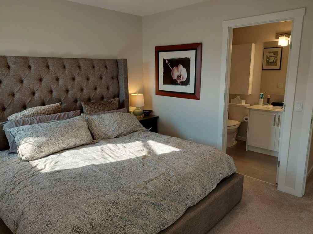 MLS® A2255107 - 214 Cranbrook Square SE in Cranston Calgary, Residential
