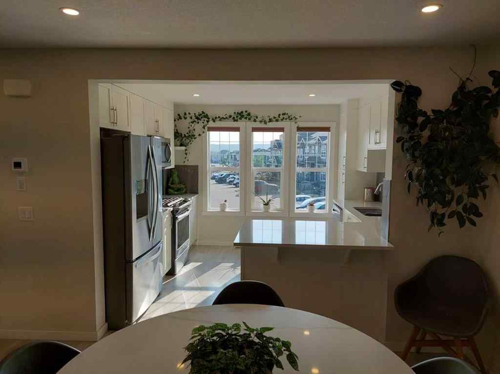 MLS® A2255107 - 214 Cranbrook Square SE in Cranston Calgary, Residential