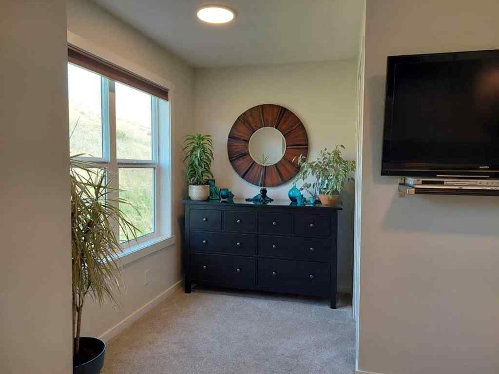 MLS® A2255107 - 214 Cranbrook Square SE in Cranston Calgary, Residential