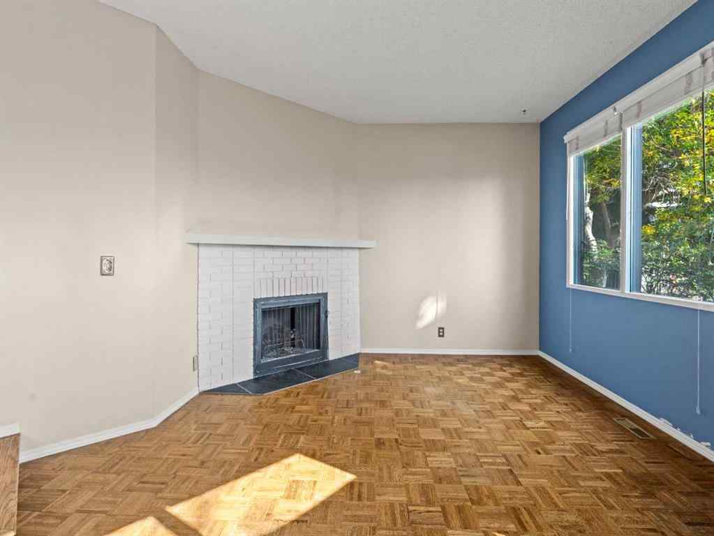 MLS® A2255111 - Unit #10 8533 Silver Springs Road NW in Silver Springs Calgary, Residential