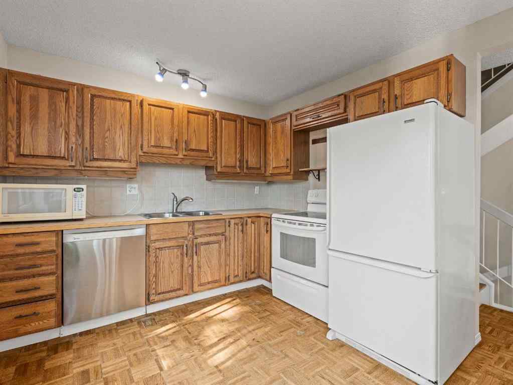 MLS® A2255111 - Unit #10 8533 Silver Springs Road NW in Silver Springs Calgary, Residential