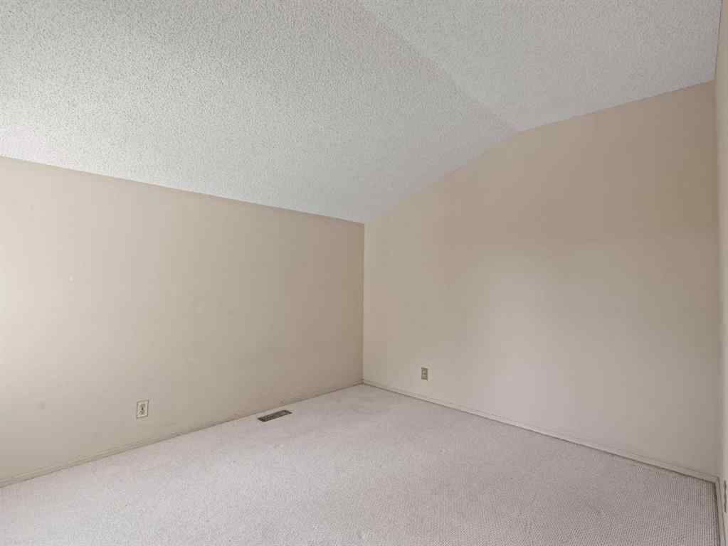 MLS® A2255111 - Unit #10 8533 Silver Springs Road NW in Silver Springs Calgary, Residential