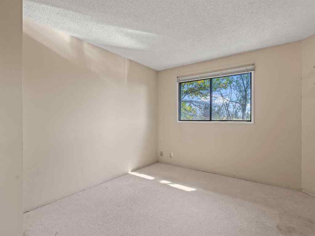 MLS® A2255111 - Unit #10 8533 Silver Springs Road NW in Silver Springs Calgary, Residential