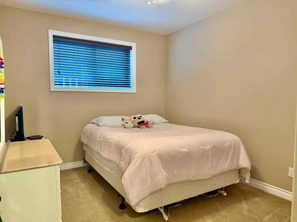 MLS® A2255114 - 10214 82 Street  in Saddleback Ridge Peace River, Residential