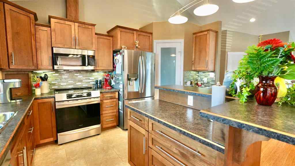 MLS® A2255114 - 10214 82 Street  in Saddleback Ridge Peace River, Residential