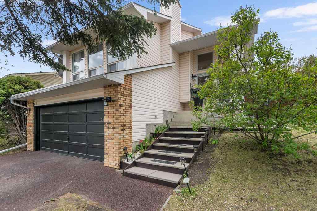 MLS® A2255159 - 212 Woodbine Boulevard SW in Woodbine Calgary, Residential