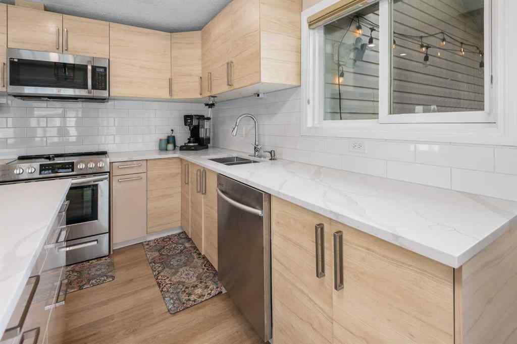 MLS® A2255159 - 212 Woodbine Boulevard SW in Woodbine Calgary, Residential