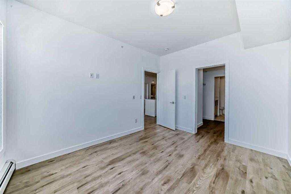 MLS® A2255168 - Unit #1212 681 Savanna Boulevard NE in Saddle Ridge Calgary, Residential