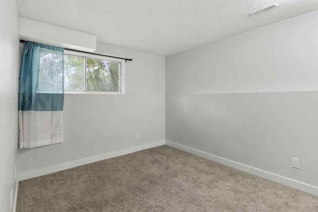 MLS® A2255178 - 200 Macewan Glen Drive NW in MacEwan Glen Calgary, Residential