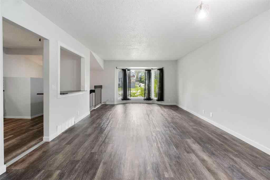 MLS® A2255178 - 200 Macewan Glen Drive NW in MacEwan Glen Calgary, Residential