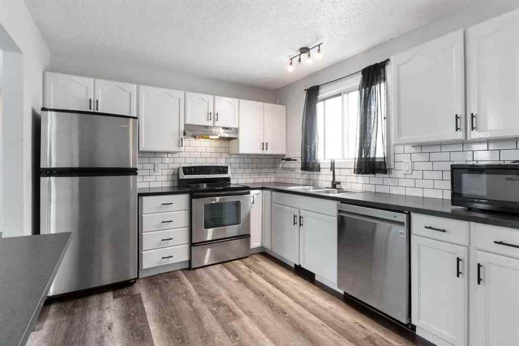 MLS® A2255178 - 200 Macewan Glen Drive NW in MacEwan Glen Calgary, Residential