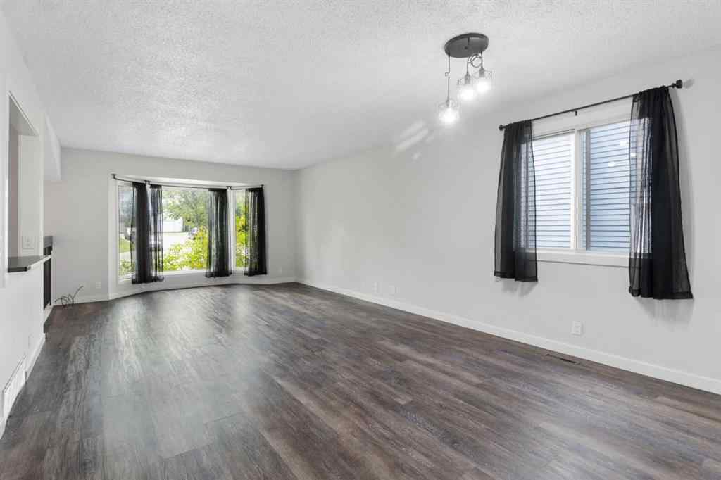 MLS® A2255178 - 200 Macewan Glen Drive NW in MacEwan Glen Calgary, Residential