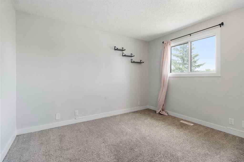MLS® A2255178 - 200 Macewan Glen Drive NW in MacEwan Glen Calgary, Residential