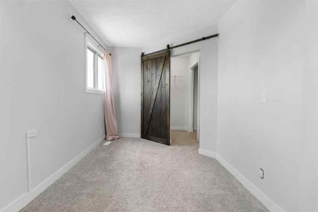 MLS® A2255178 - 200 Macewan Glen Drive NW in MacEwan Glen Calgary, Residential