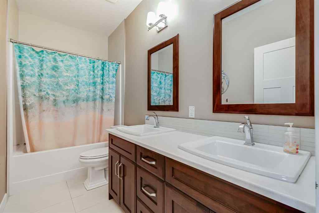 MLS® A2255186 - 42 Cooperstown Court SW in Coopers Crossing Airdrie, Residential
