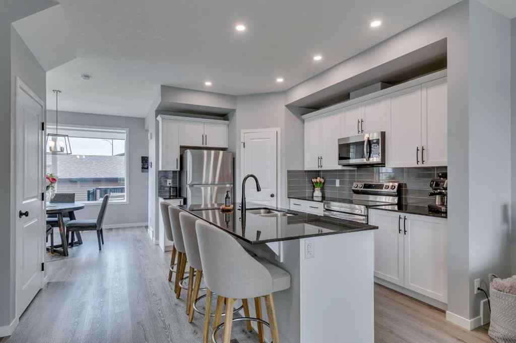 MLS® A2255196 - 63 Wolf Gate  in Wedderburn Okotoks, Residential