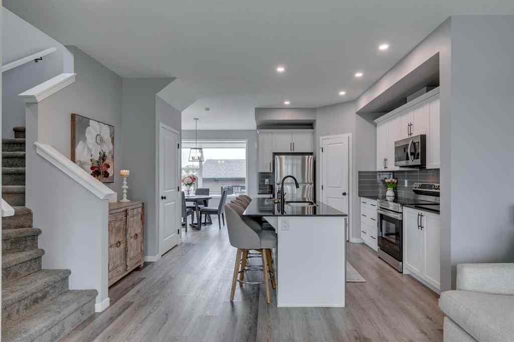 MLS® A2255196 - 63 Wolf Gate  in Wedderburn Okotoks, Residential