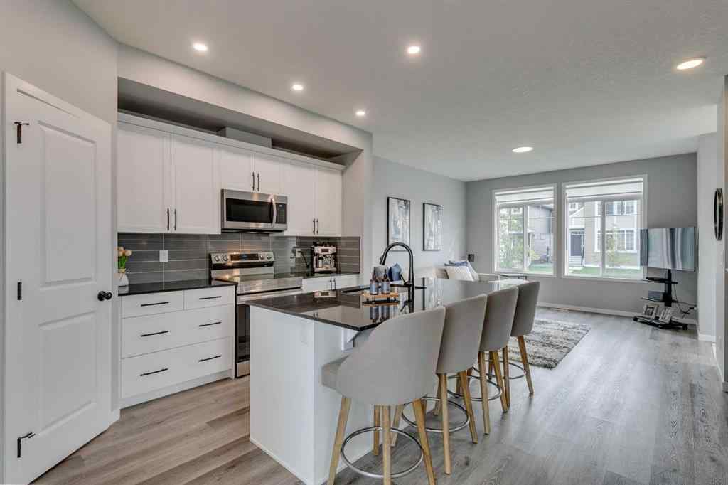 MLS® A2255196 - 63 Wolf Gate  in Wedderburn Okotoks, Residential