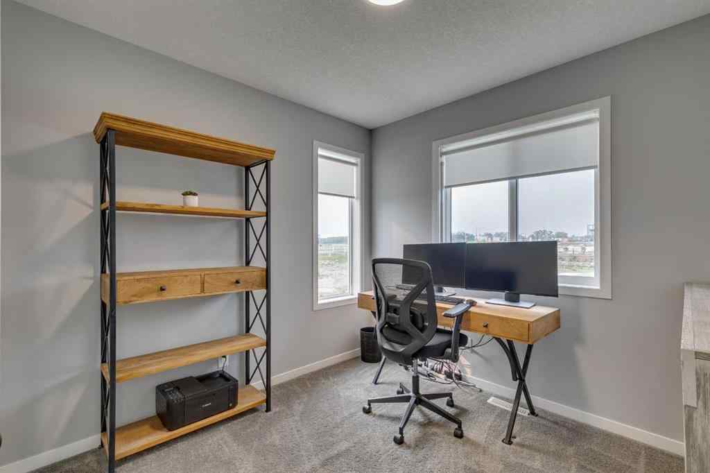 MLS® A2255196 - 63 Wolf Gate  in Wedderburn Okotoks, Residential