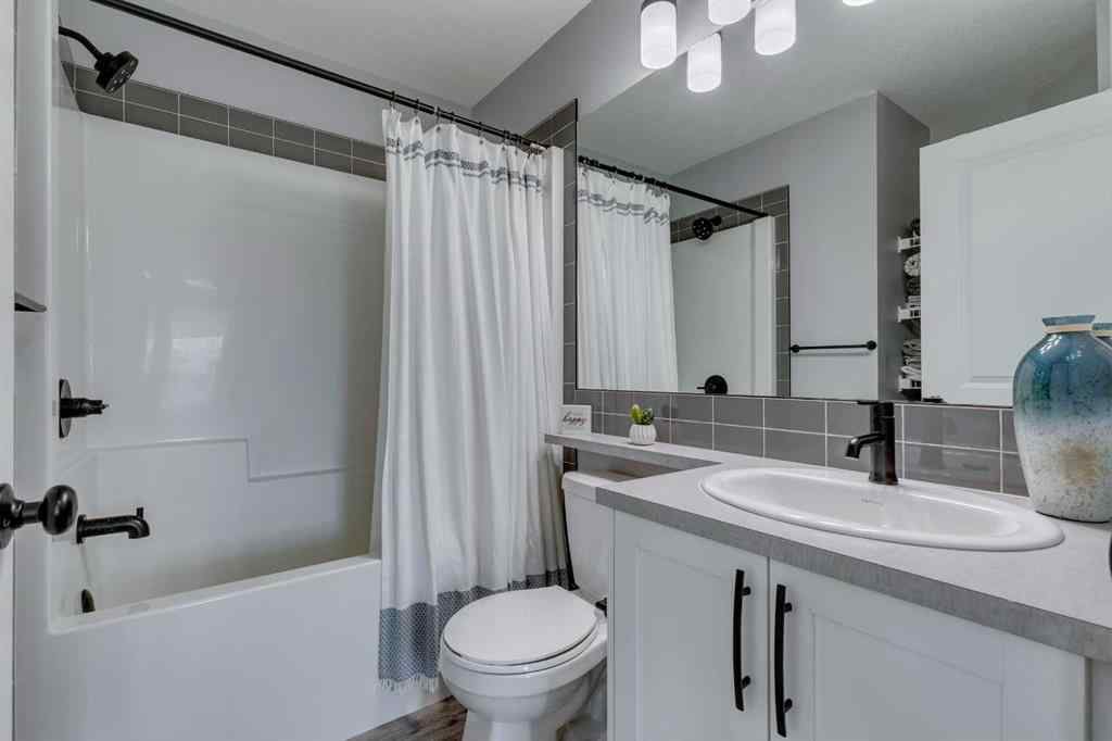 MLS® A2255196 - 63 Wolf Gate  in Wedderburn Okotoks, Residential