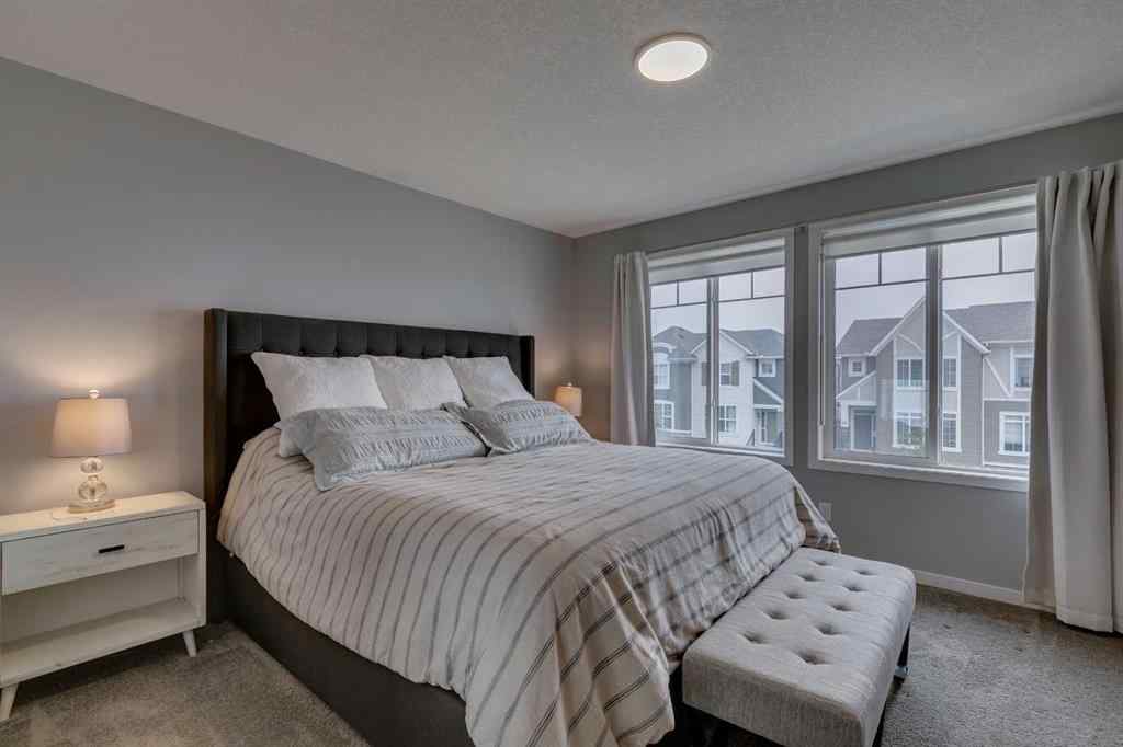 MLS® A2255196 - 63 Wolf Gate  in Wedderburn Okotoks, Residential