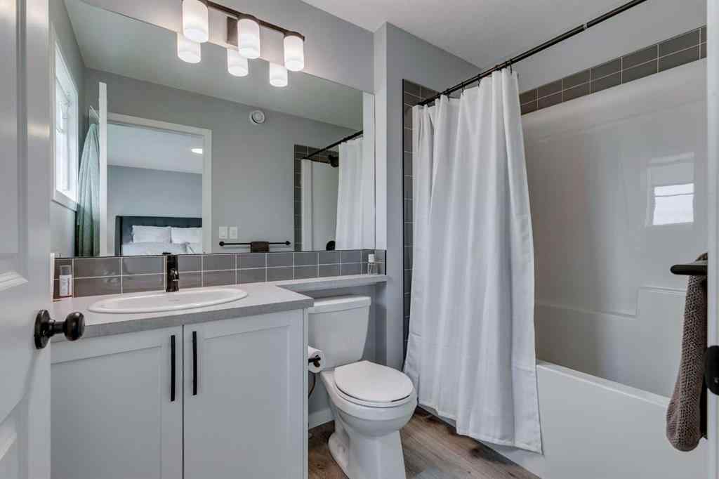 MLS® A2255196 - 63 Wolf Gate  in Wedderburn Okotoks, Residential